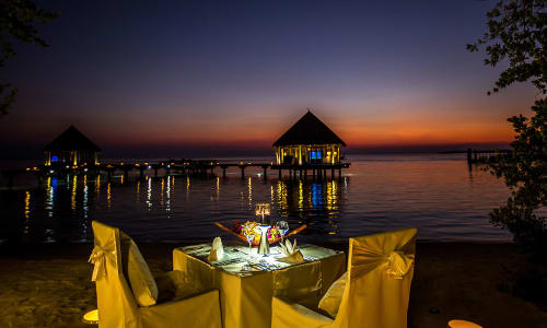 Romantic candlelit dinner on the beach Maldives